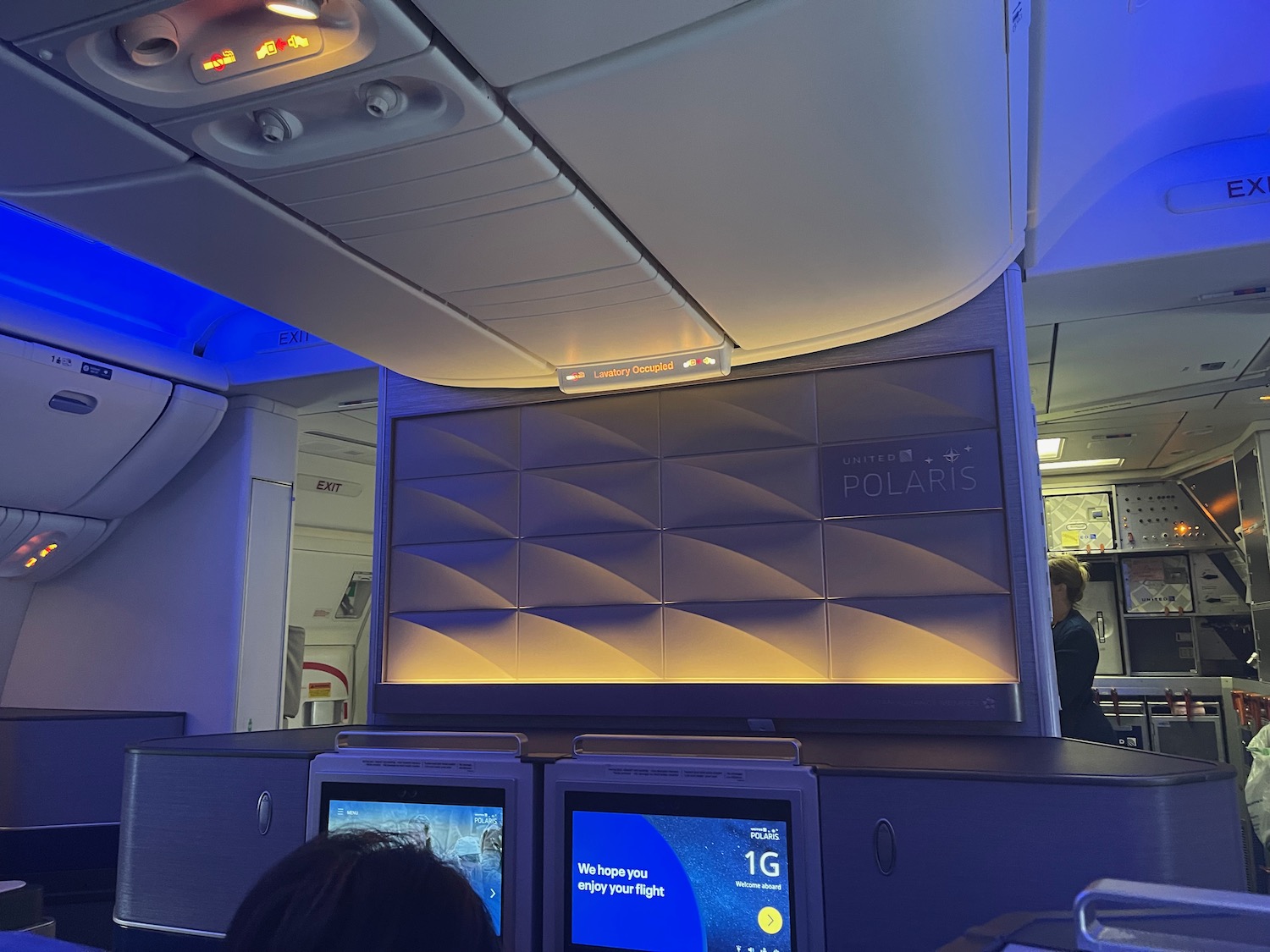 a tvs and screens in an airplane