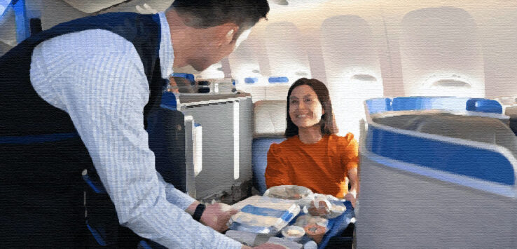 a man serving food to a woman