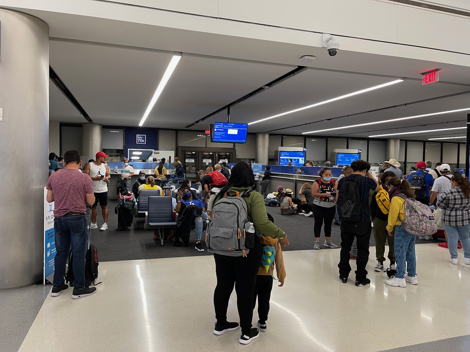 a group of people in a terminal