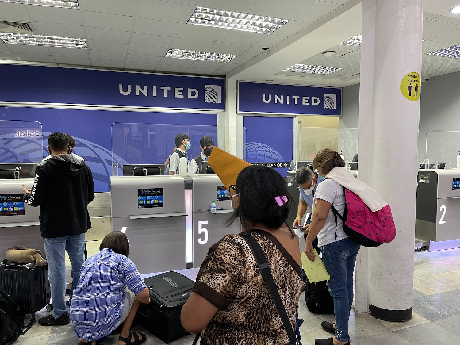 people standing in front of a counter