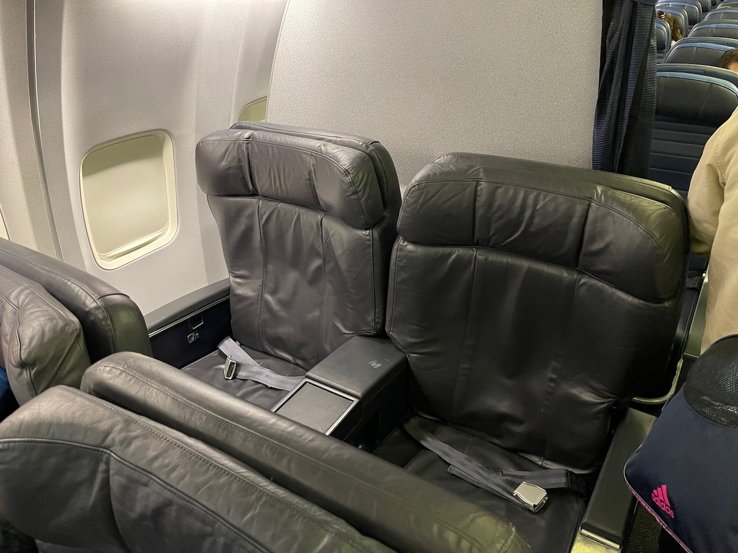 a black leather seats in an airplane