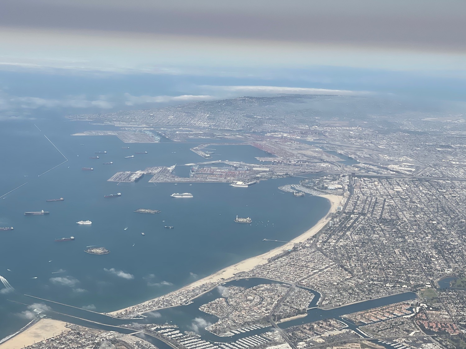 an aerial view of a city and water