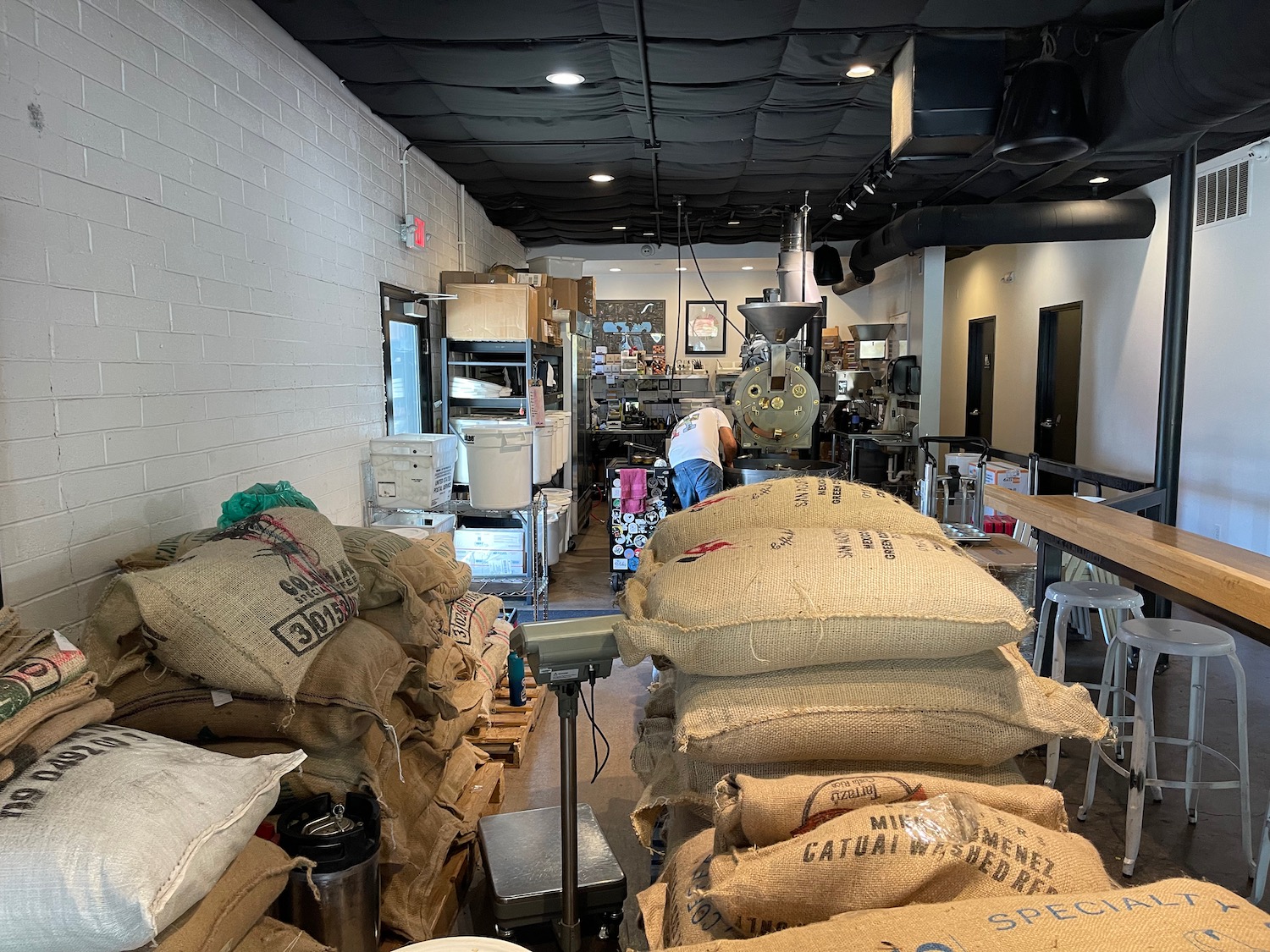 a room with many bags of coffee