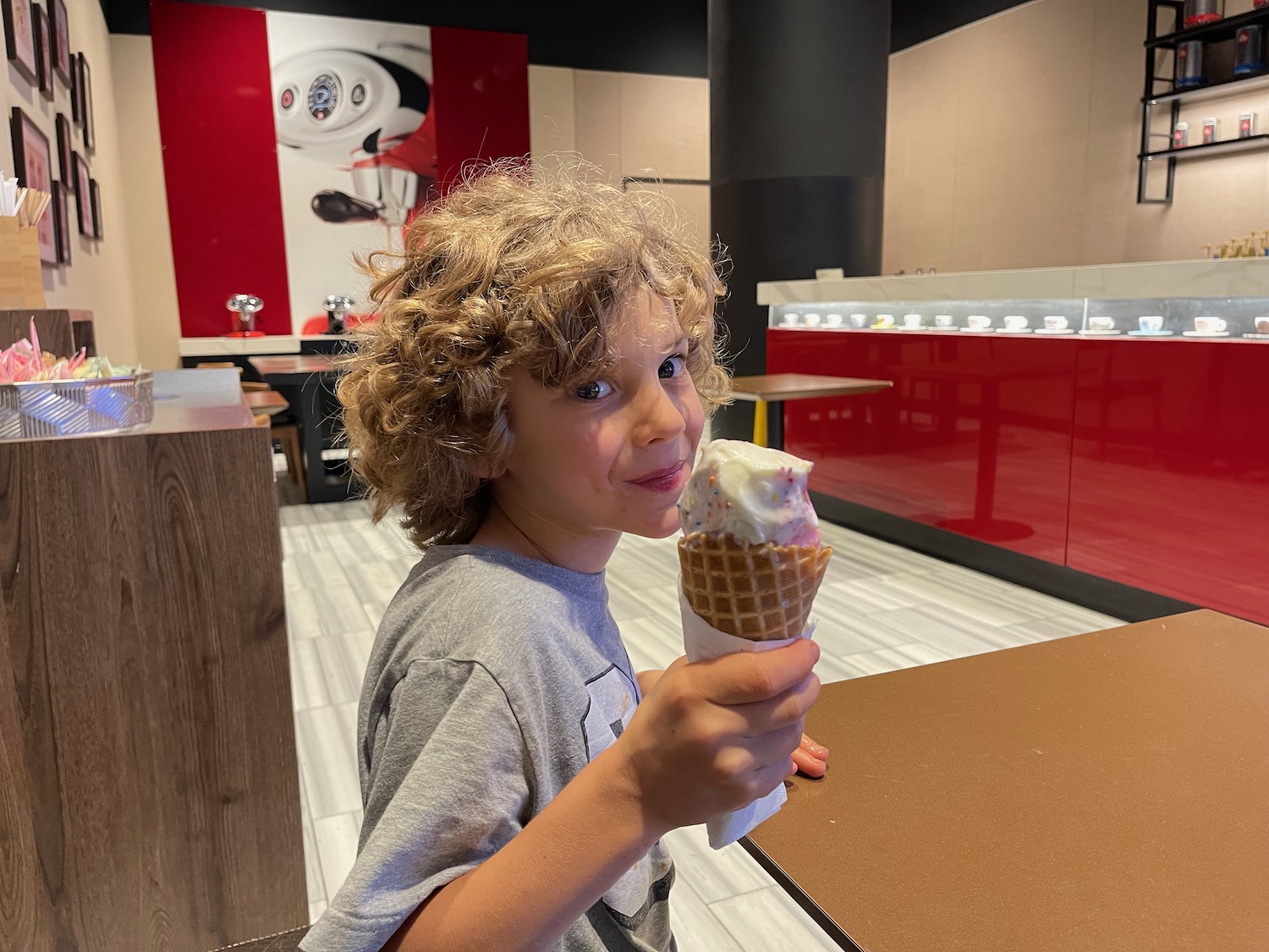 a child eating an ice cream cone