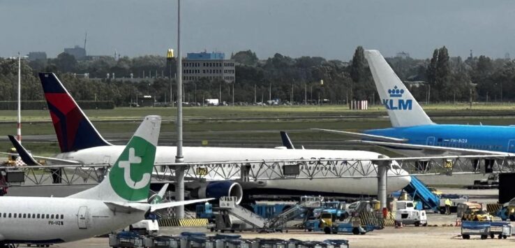 airplanes parked at an airport