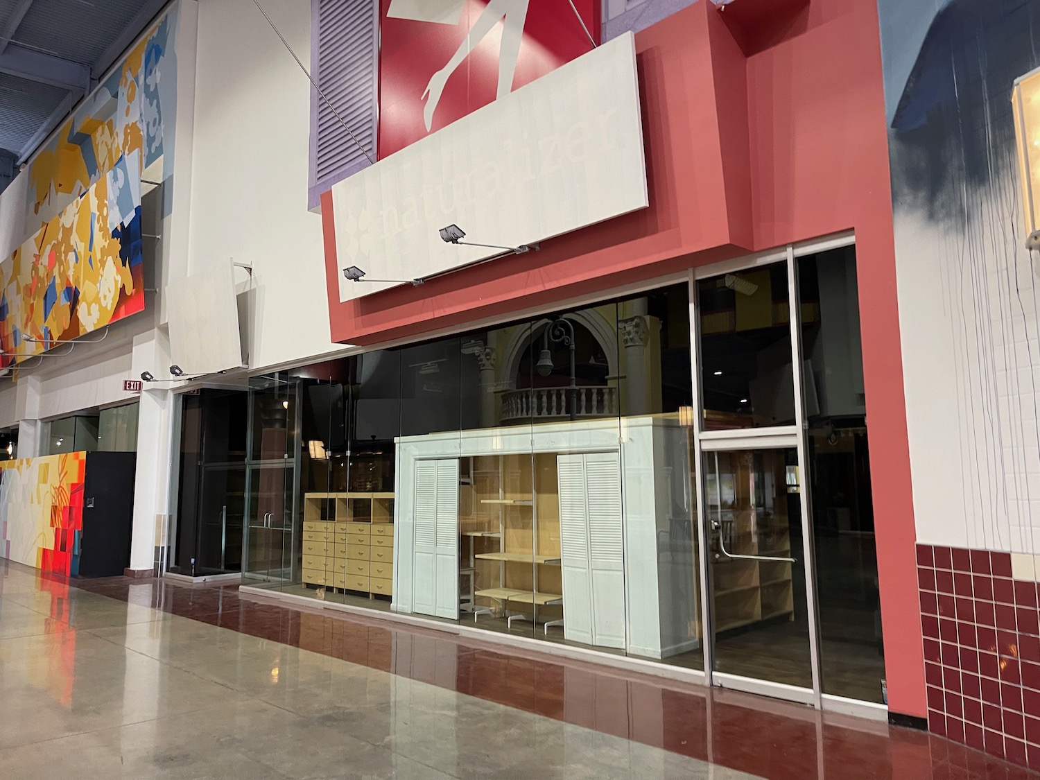 a store front with glass doors