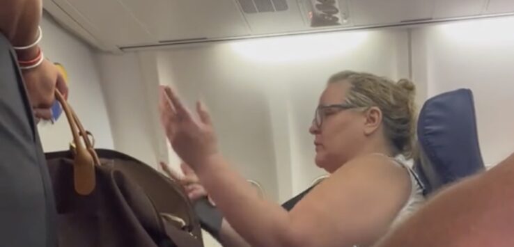 a woman sitting on a plane