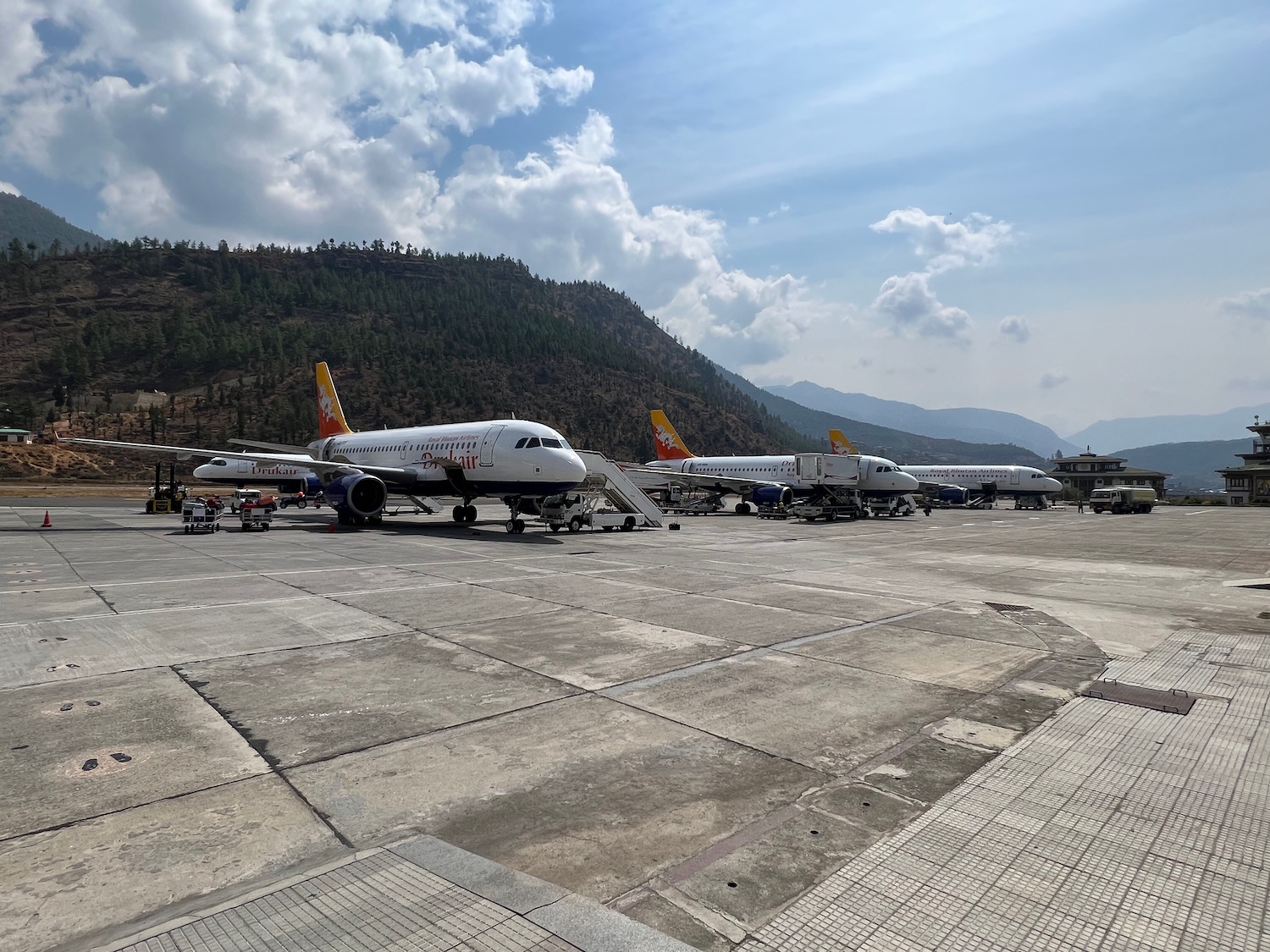 airplanes parked on a runway