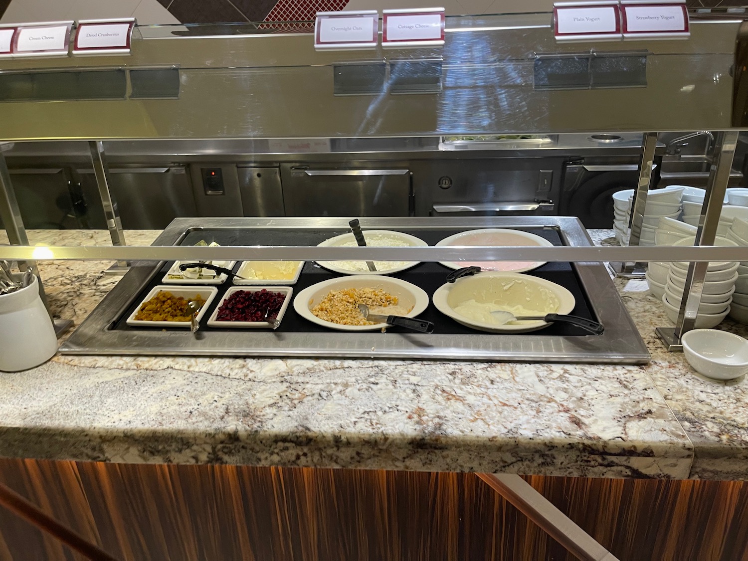 a buffet with different food items on it