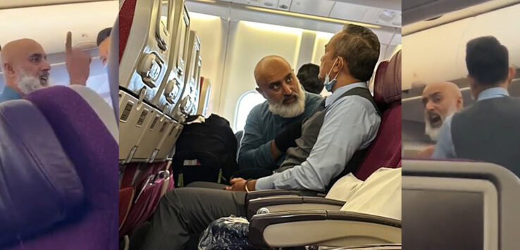 two men sitting on an airplane