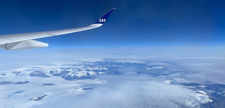 an airplane wing in the air