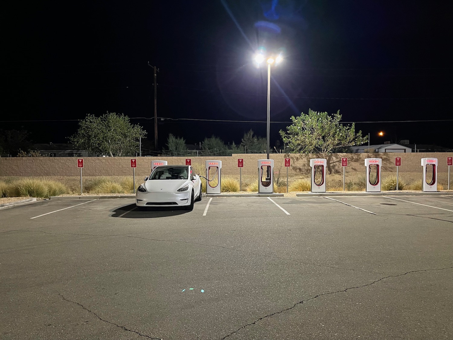 a car in a parking lot at night