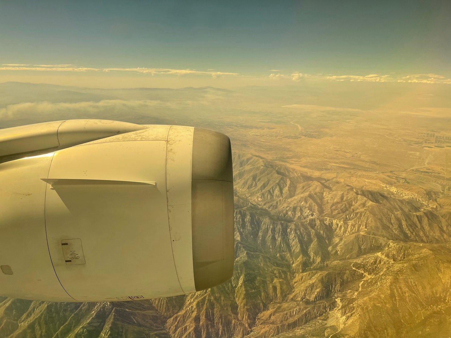 a plane engine above mountains