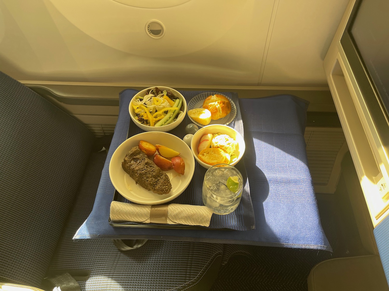 a tray of food on a seat