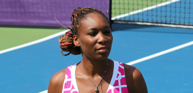 a woman in a pink tank top