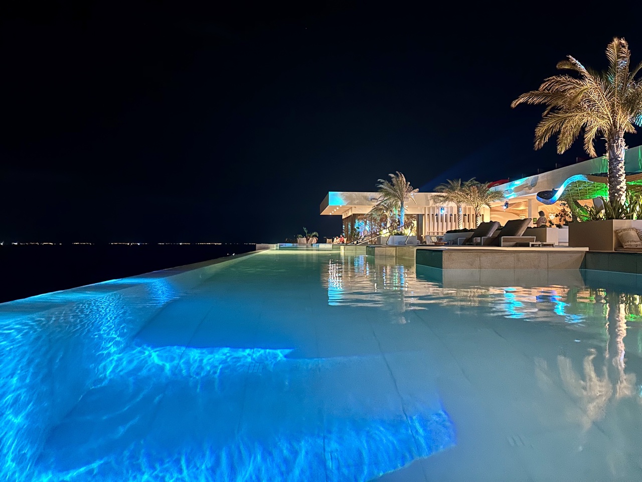 impression by secrets isla mujeres rooftop pool at night