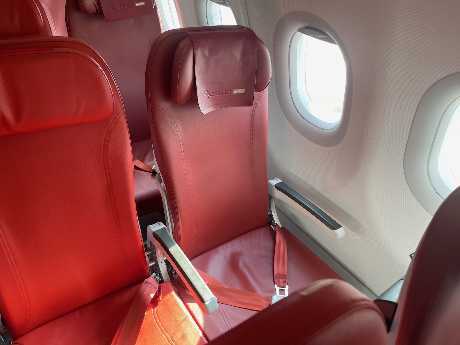 a red seats in an airplane
