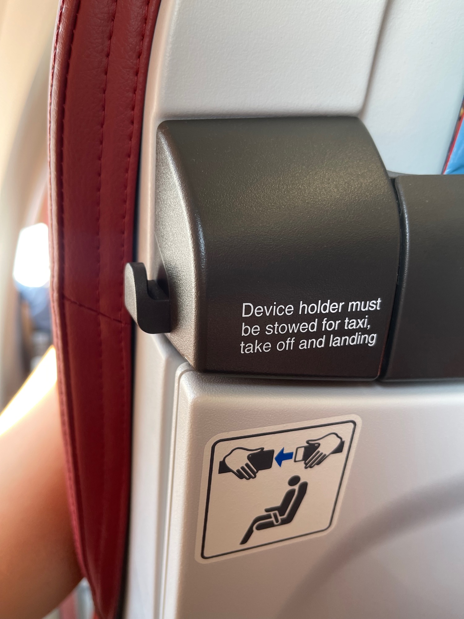 a seat belt lock on a plane