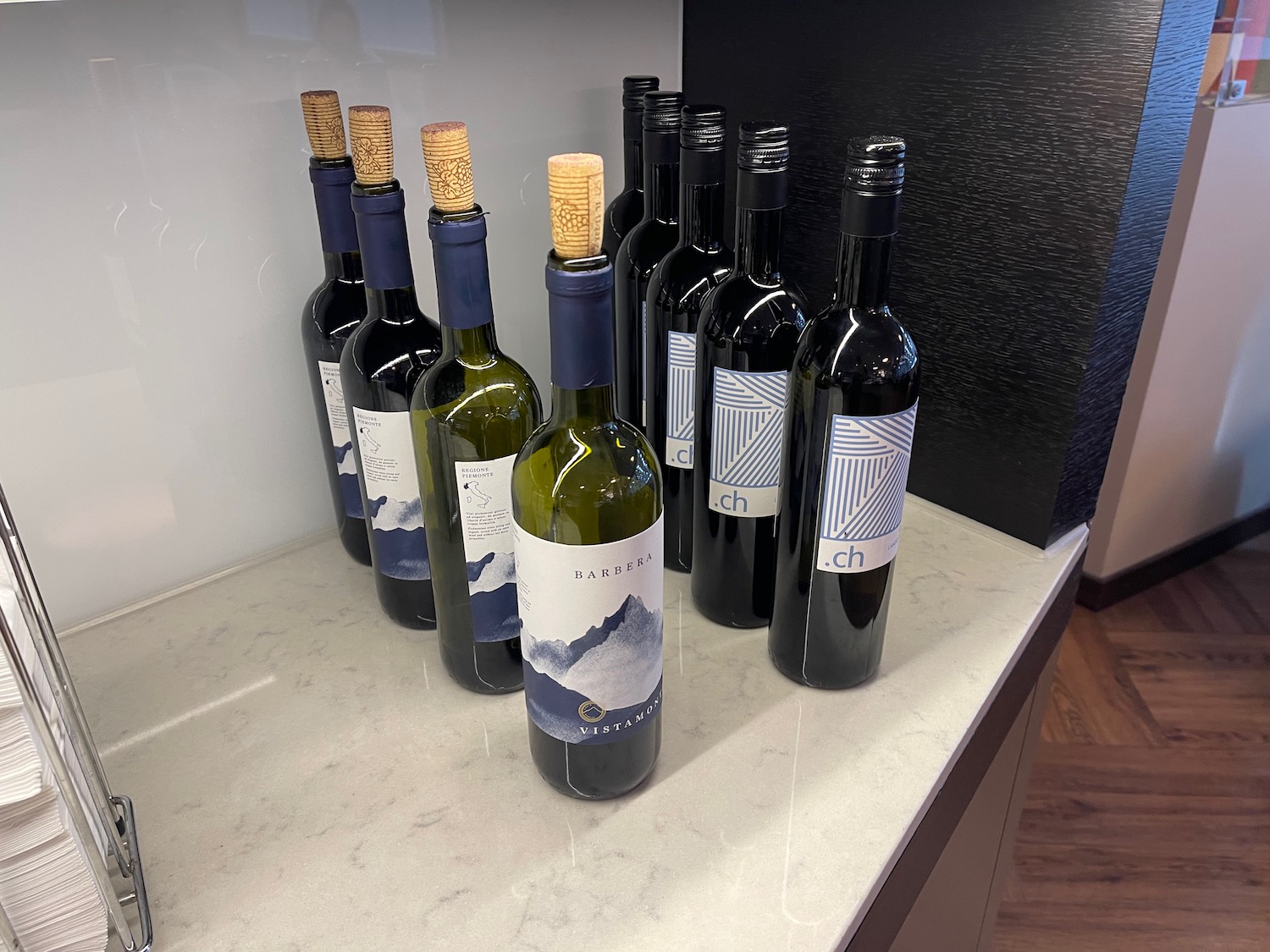 a group of wine bottles on a counter