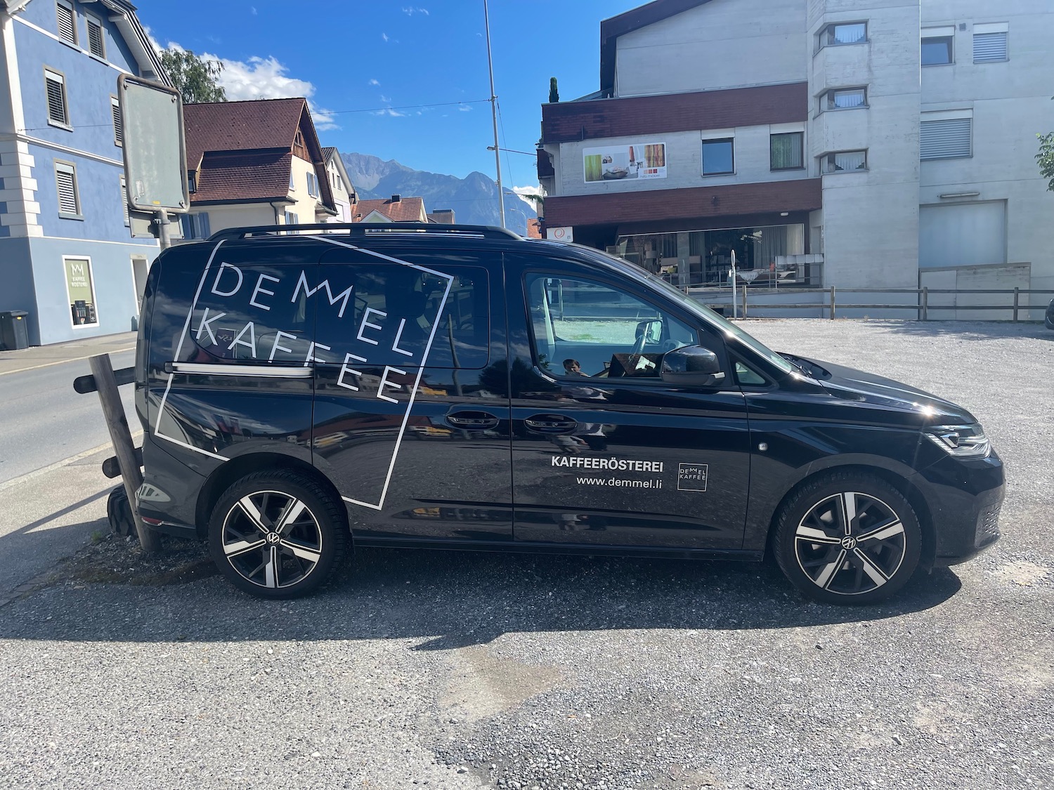 a black van parked in a parking lot