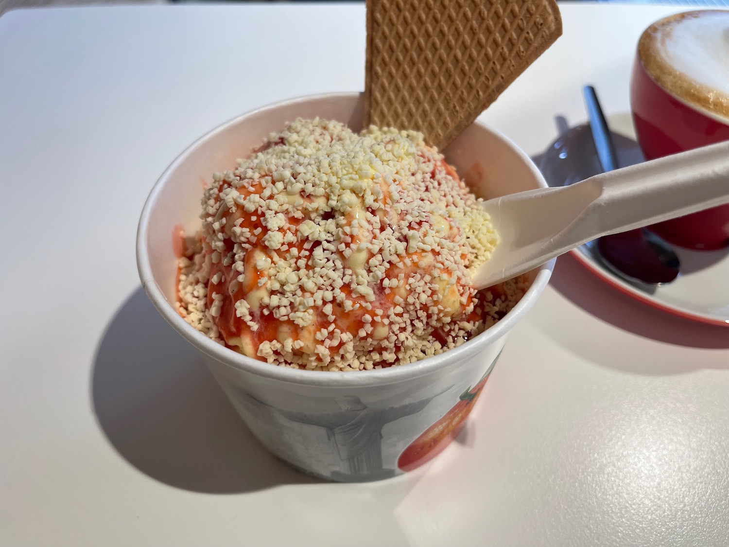 a cup of ice cream with a spoon