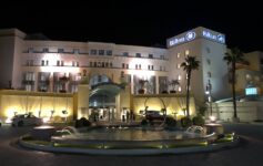 a building with a fountain in front of it