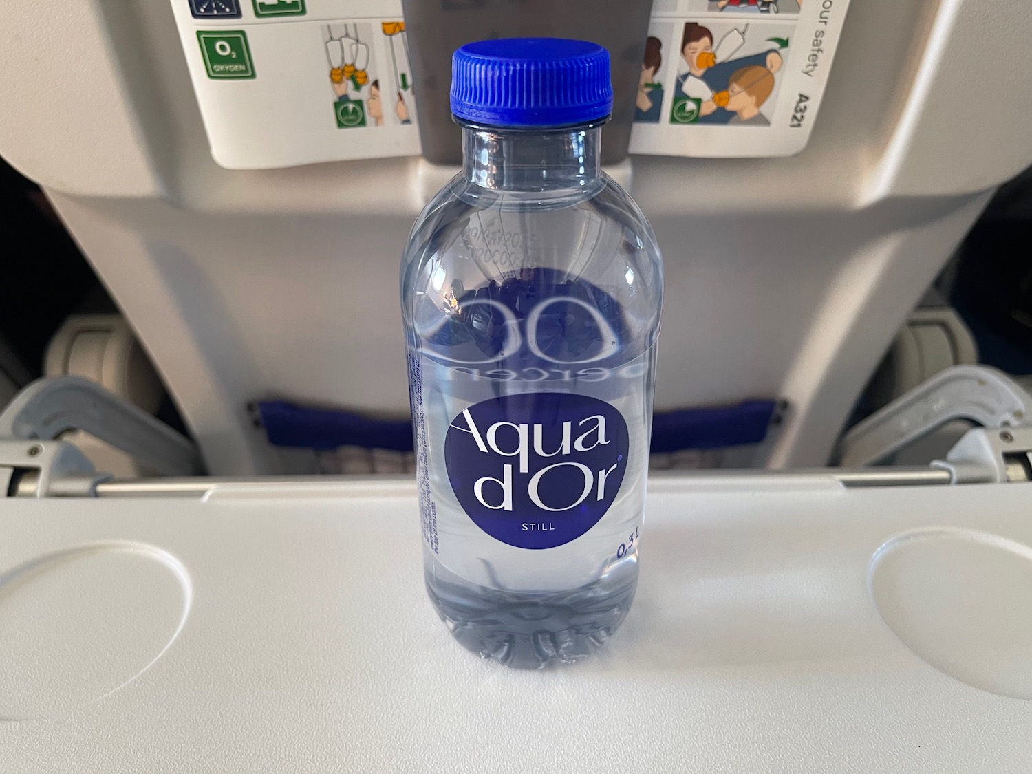 a bottle of water on a tray