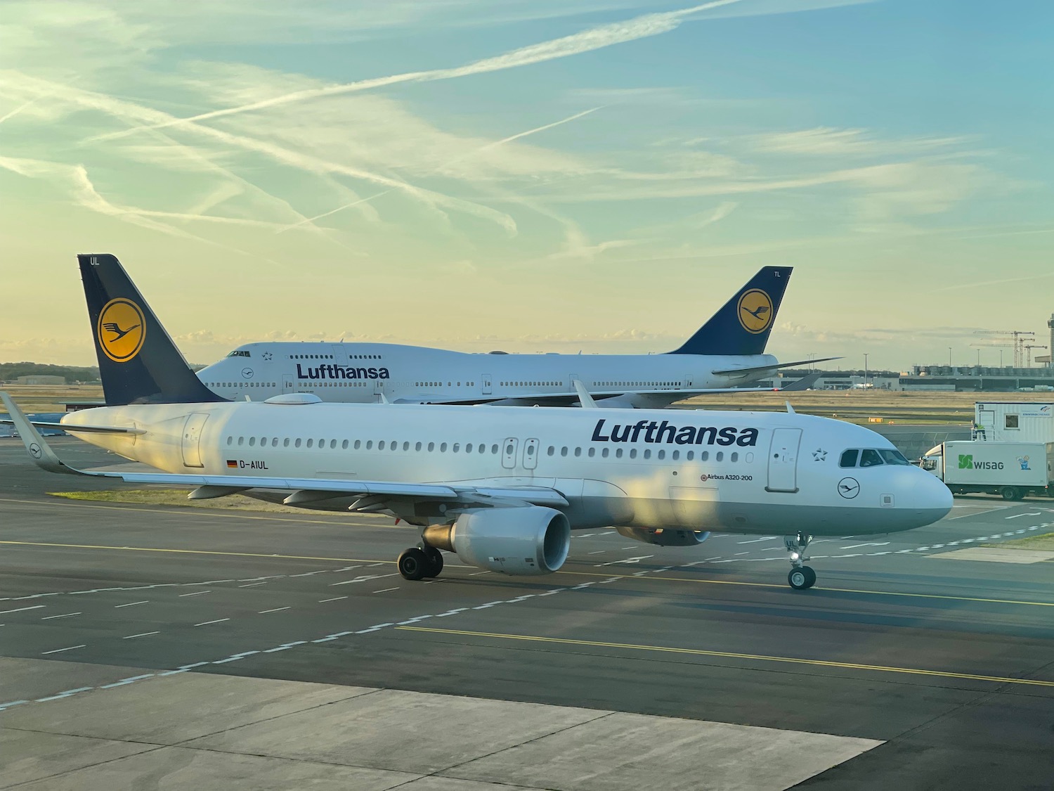 two airplanes on a runway