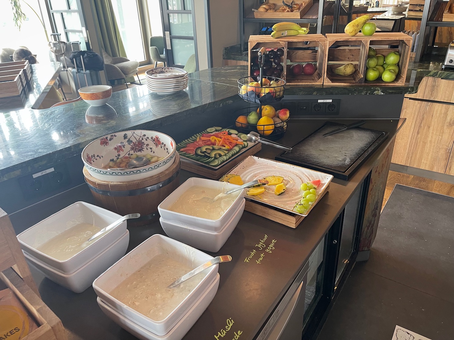 a counter with bowls of food on it