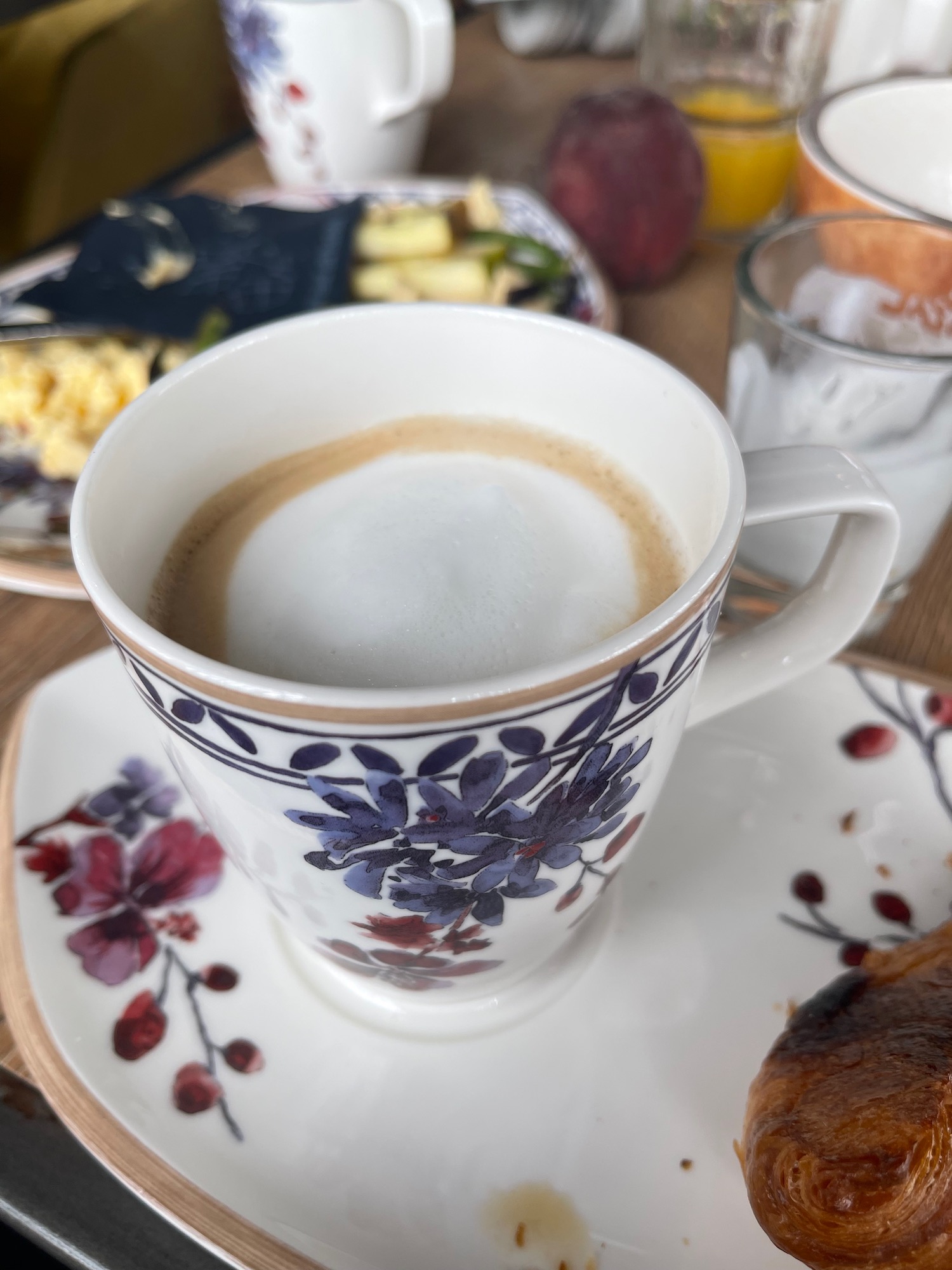 a cup of coffee on a plate