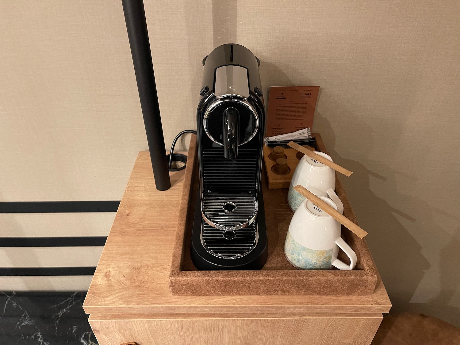 a coffee machine on a wooden box