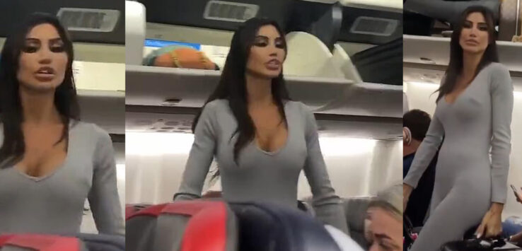 a woman standing on a plane