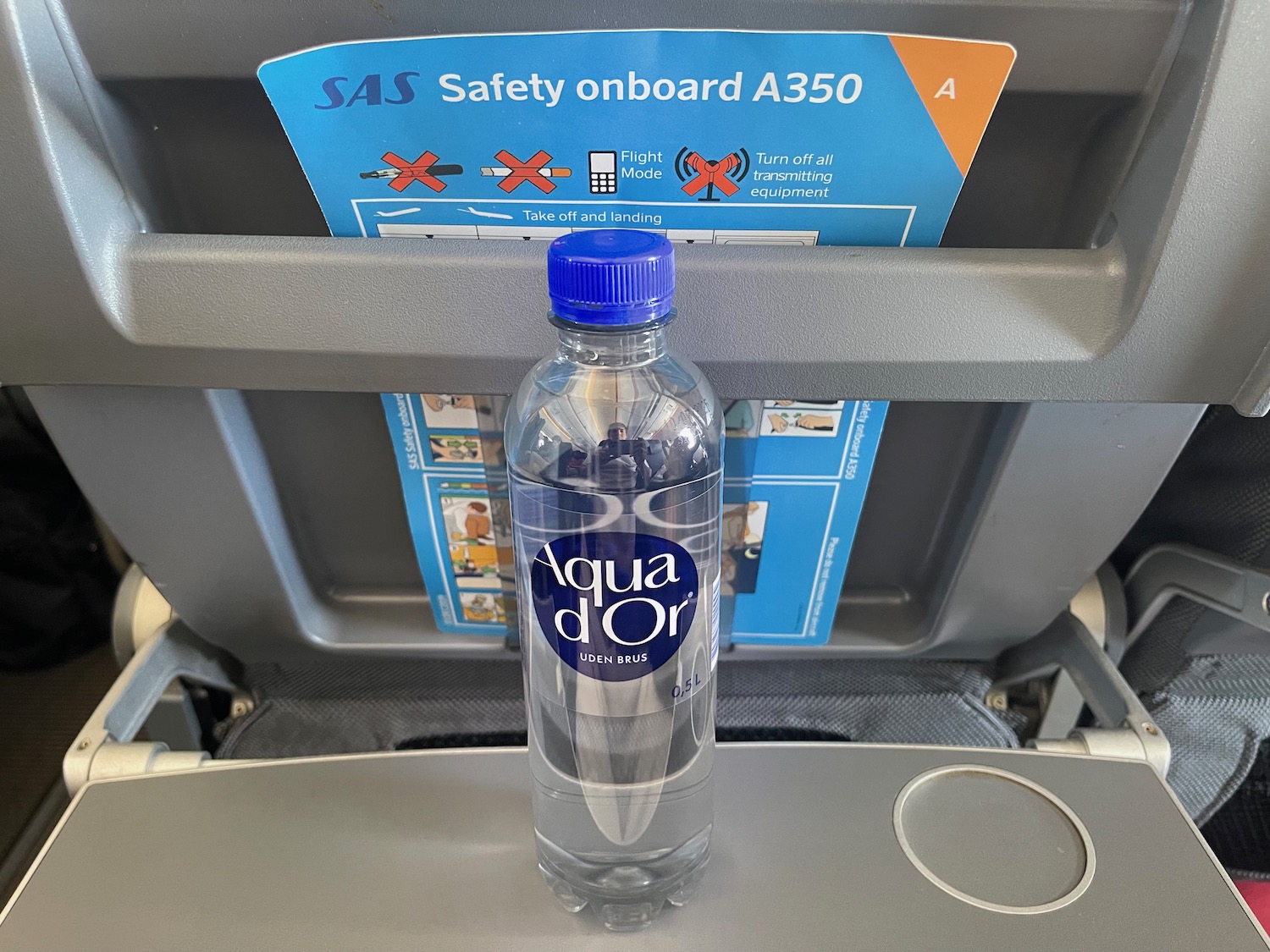 a bottle of water on a seat