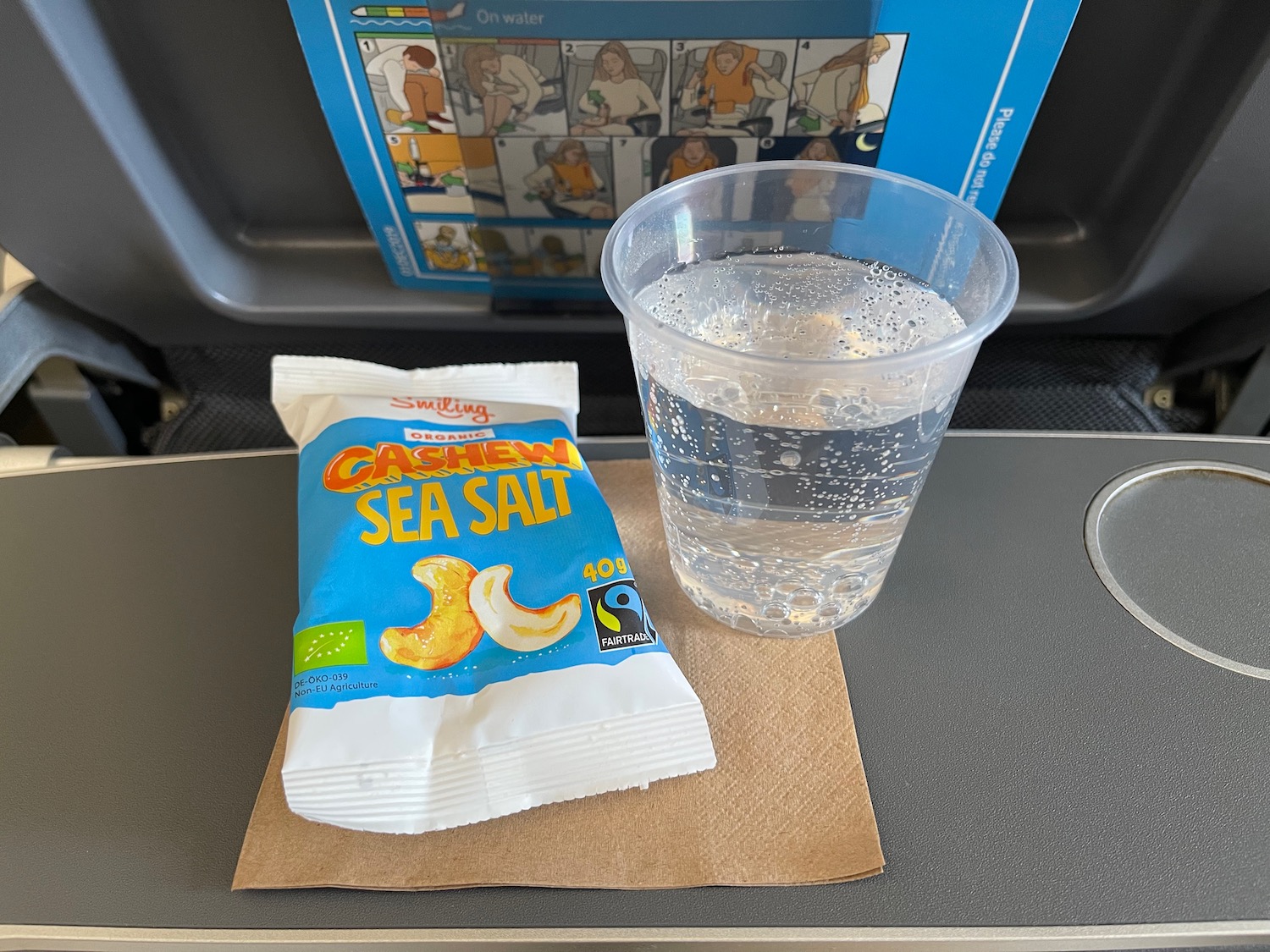 a plastic cup of water and a package of salt