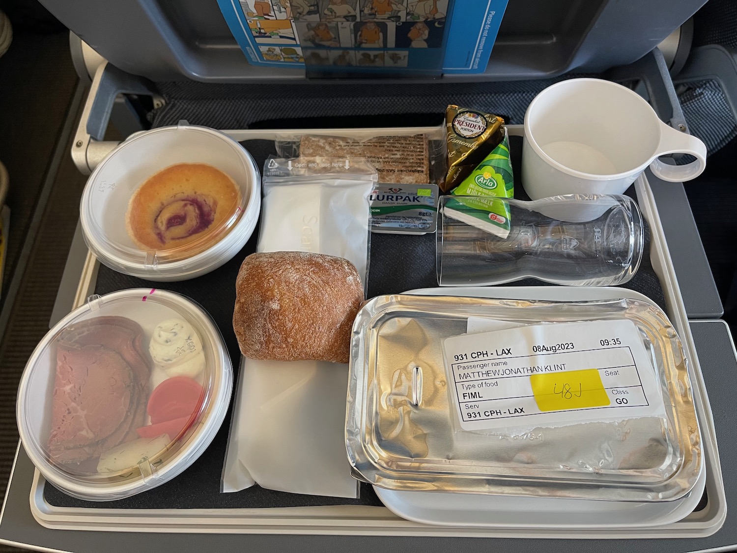 food on a tray on a plane