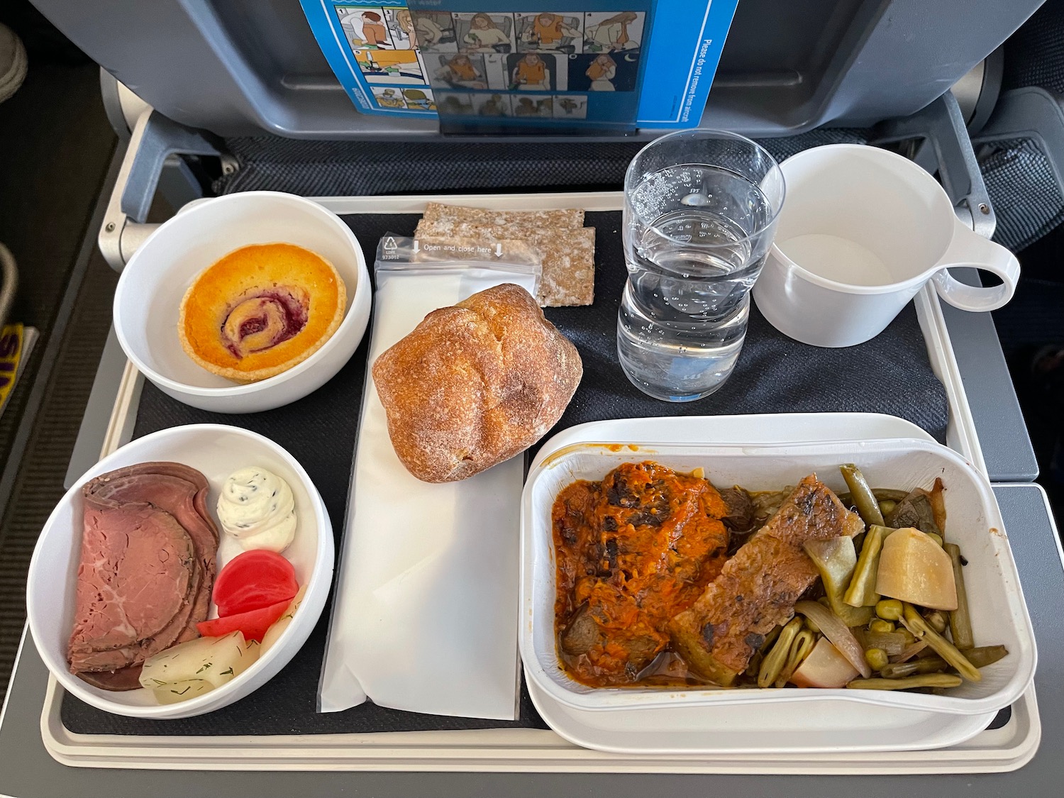 food on a tray on a plane