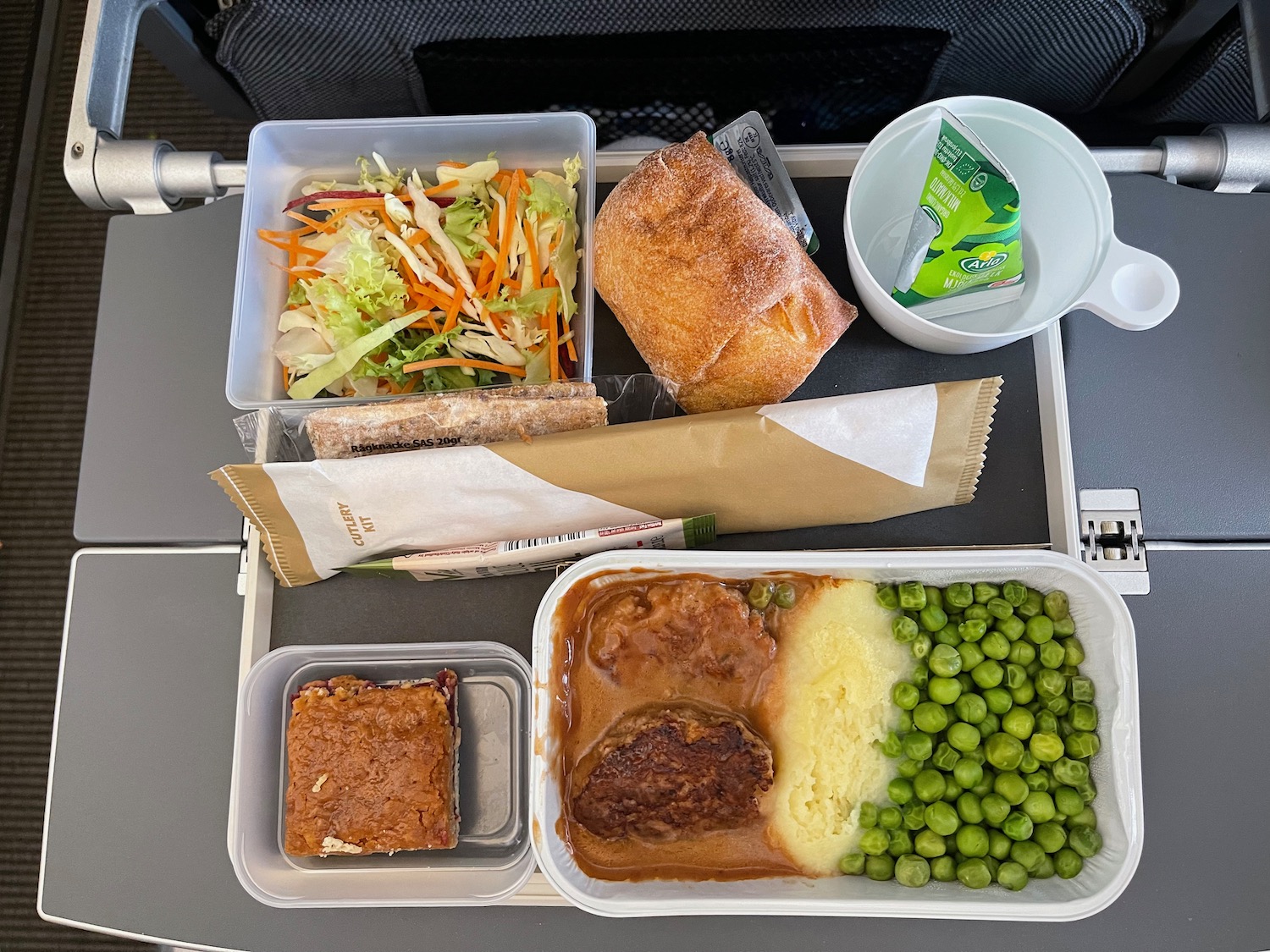 food on a tray on a plane