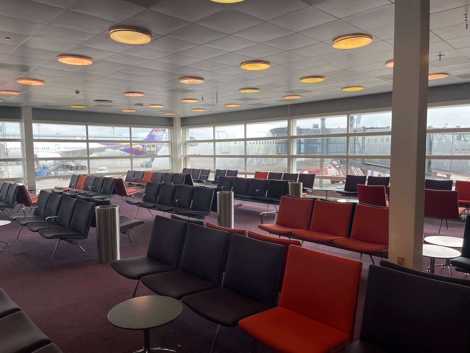 a row of chairs in an airport terminal