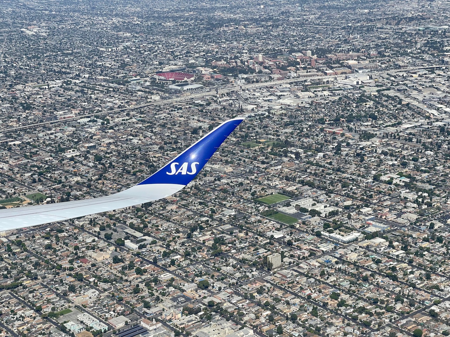 an airplane wing in the air