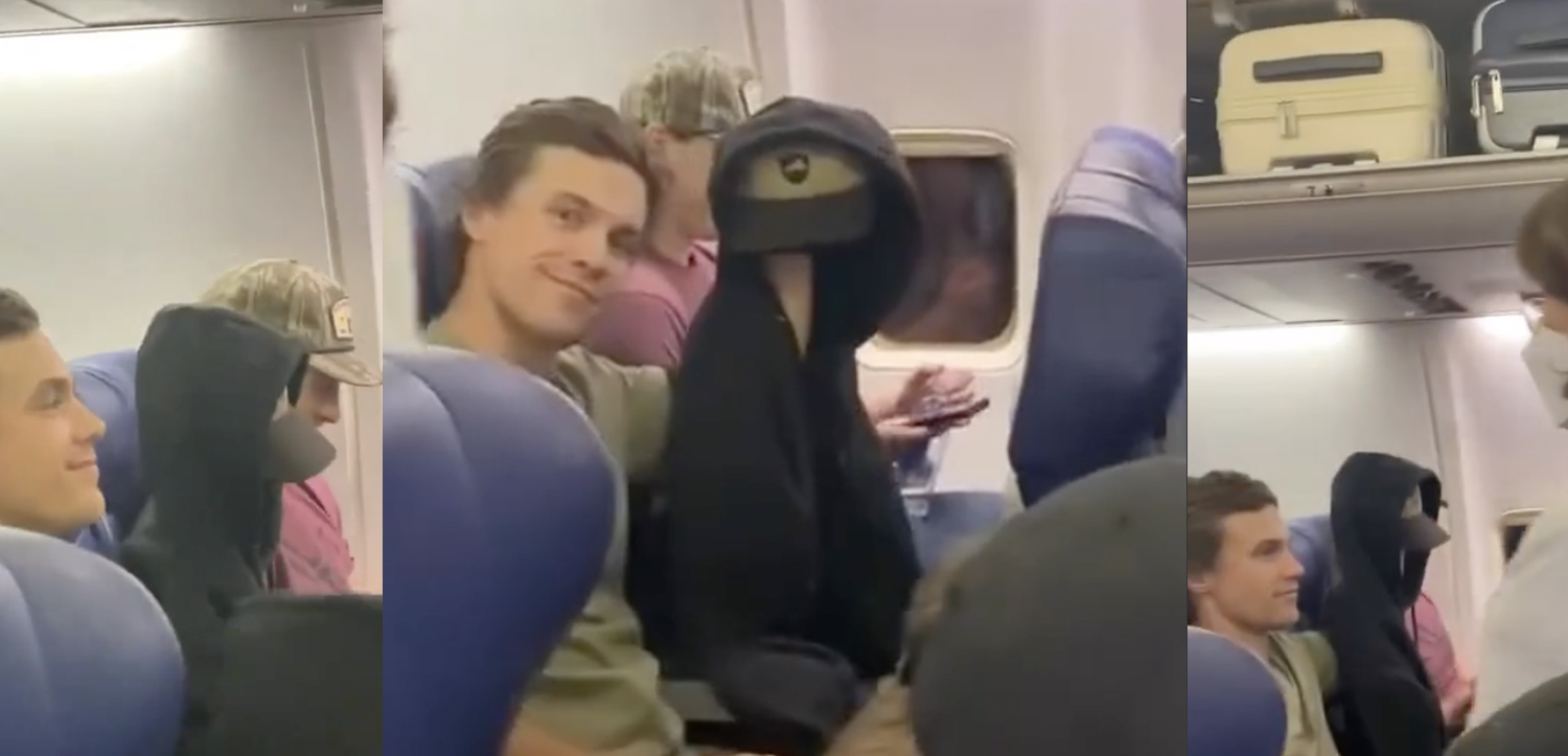 a group of people sitting on an airplane