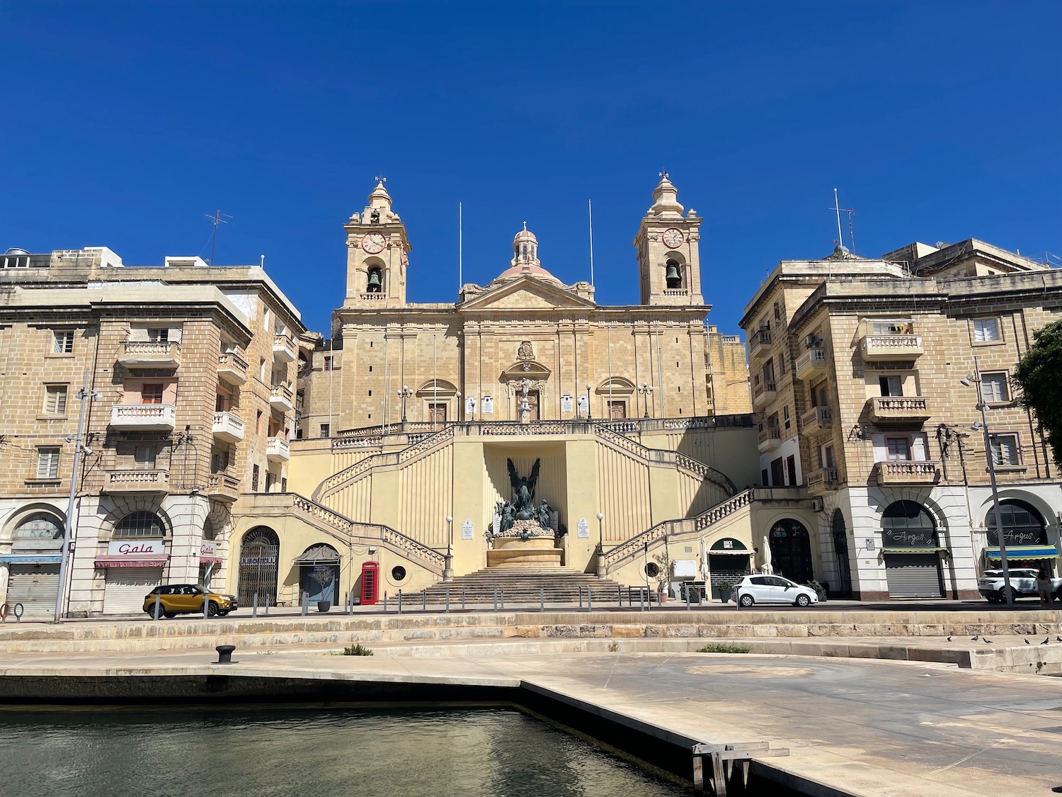 a building with a statue in front of it