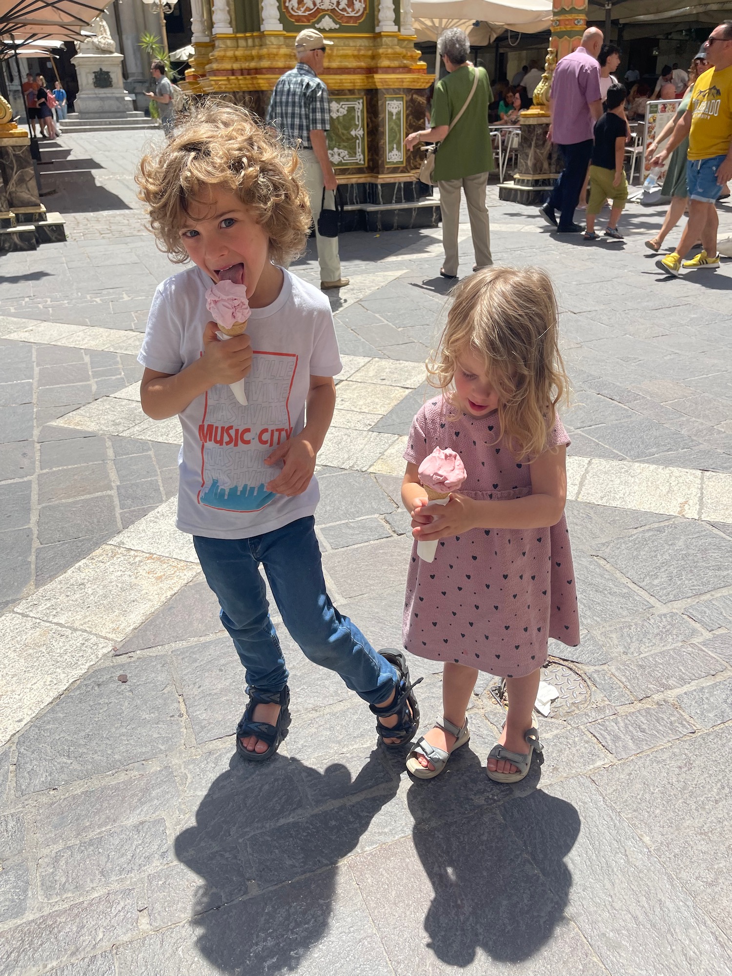 a boy and girl eating ice cream