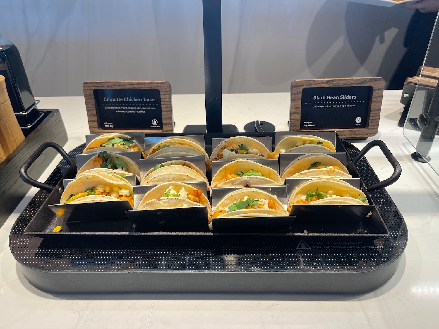 a tray of tacos on a table