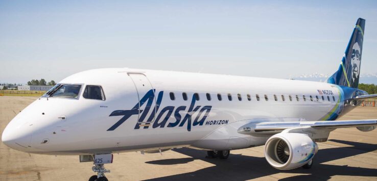 a white airplane on a tarmac