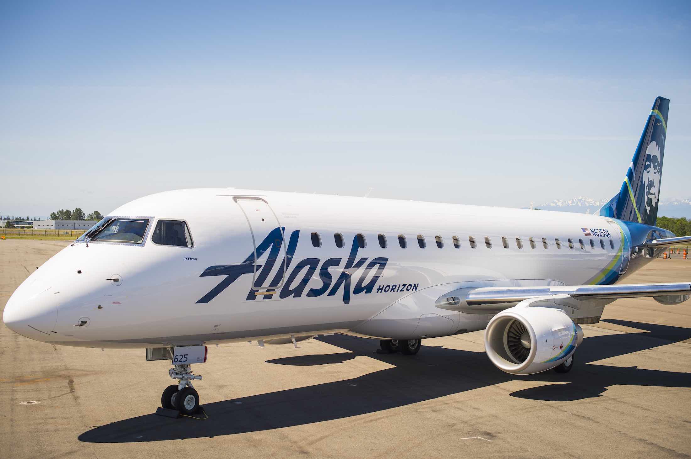 a white airplane on a tarmac