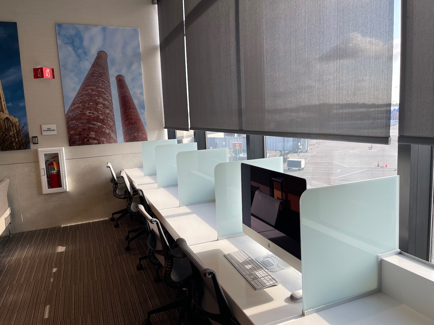 a room with a row of computers