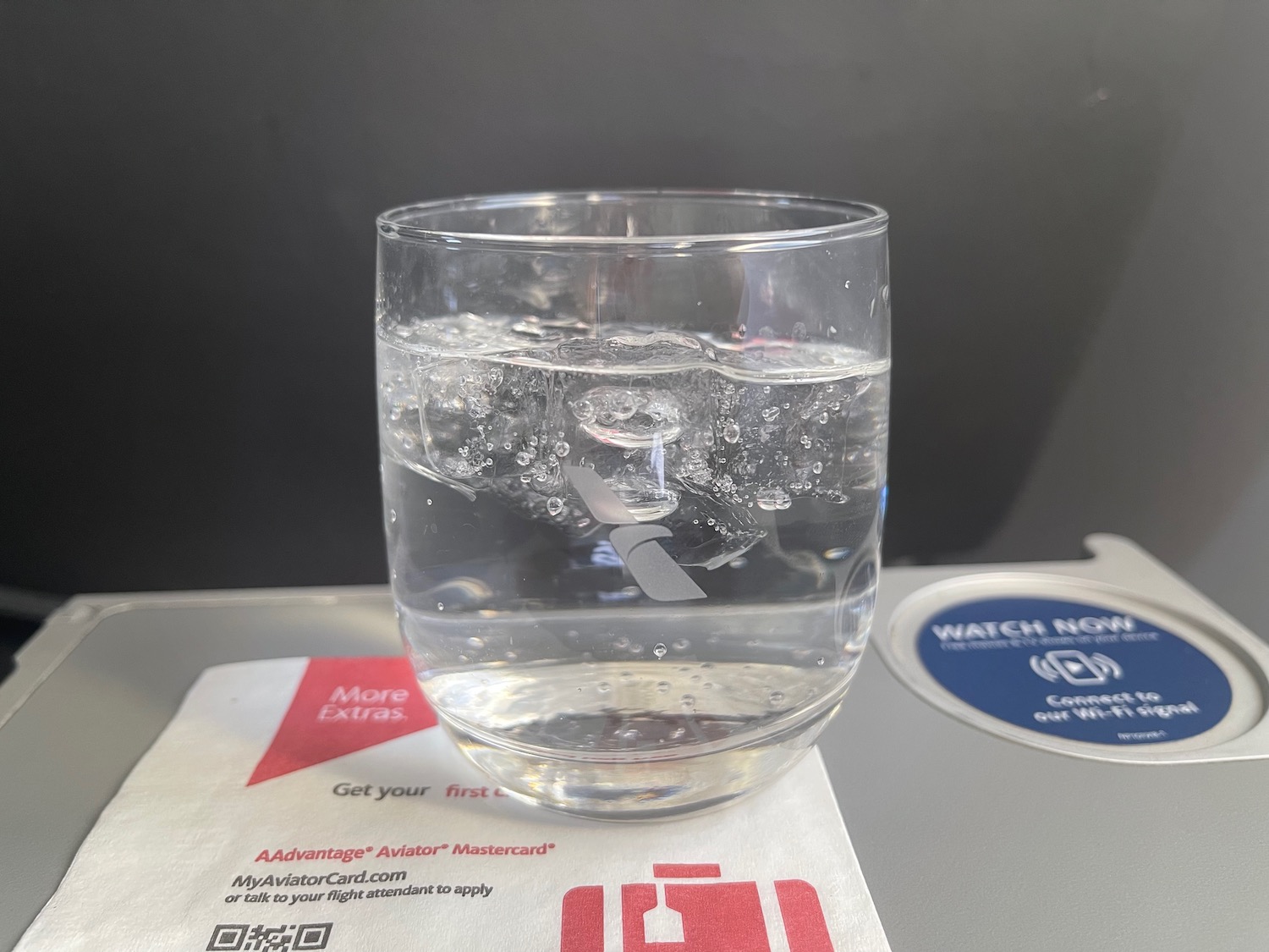 a glass of water with ice