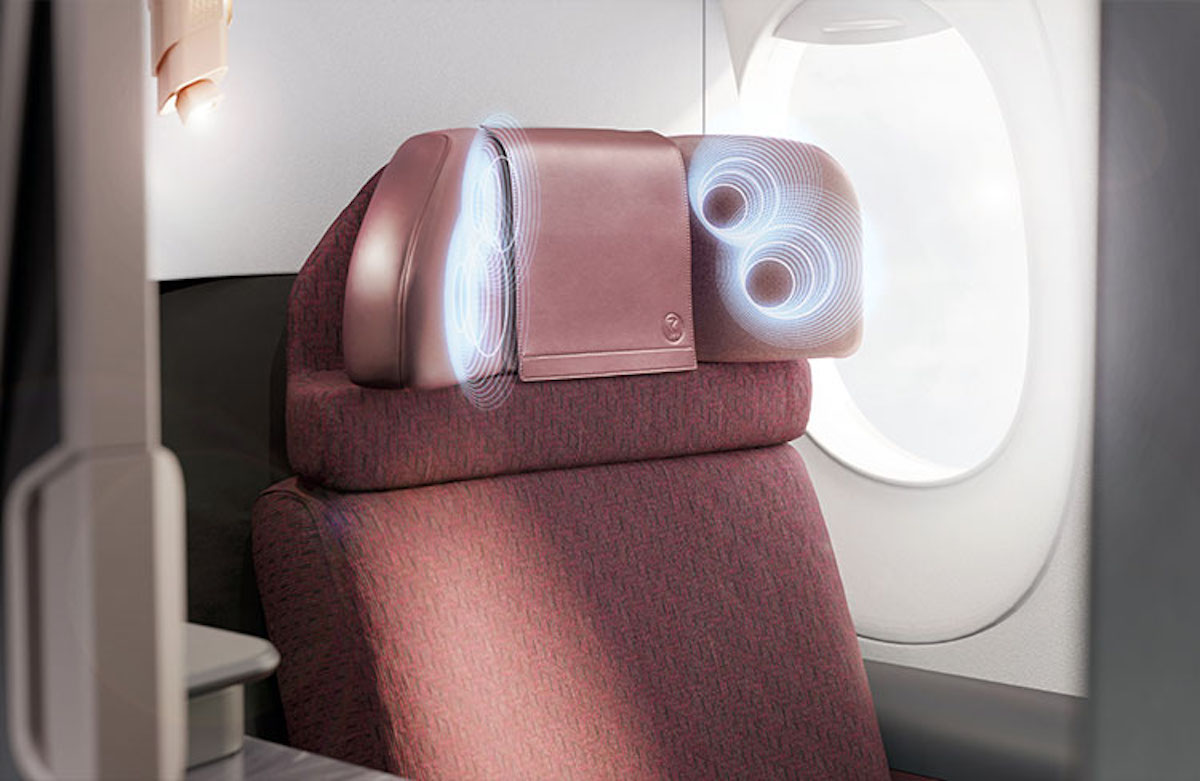 a seat with a headrest and a round window