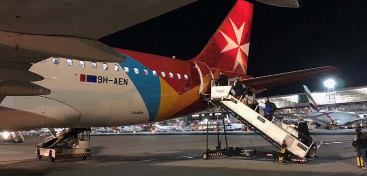 people boarding an airplane