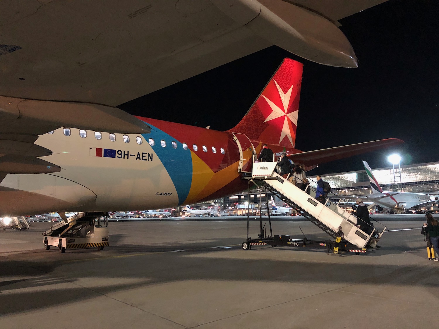 people boarding an airplane